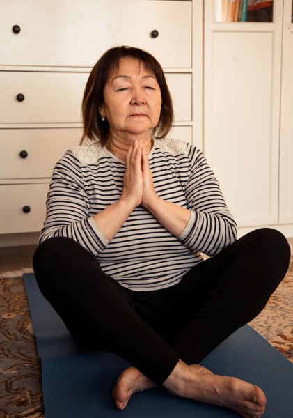 Meditation to help cause back pain caused by menopause